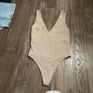 Aritzia tan tank bodysuit size XS